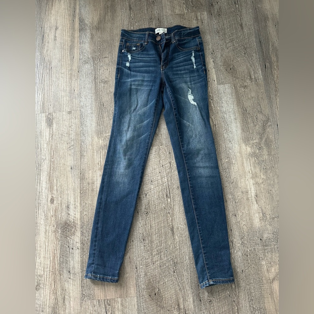 Distressed Dark Blue Denim Jeans